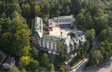 Hotel Prezydent is an elegant four-star property with a rich history dating back to the 1930s, located in the heart of the spa town of Krynica-Zdrój.